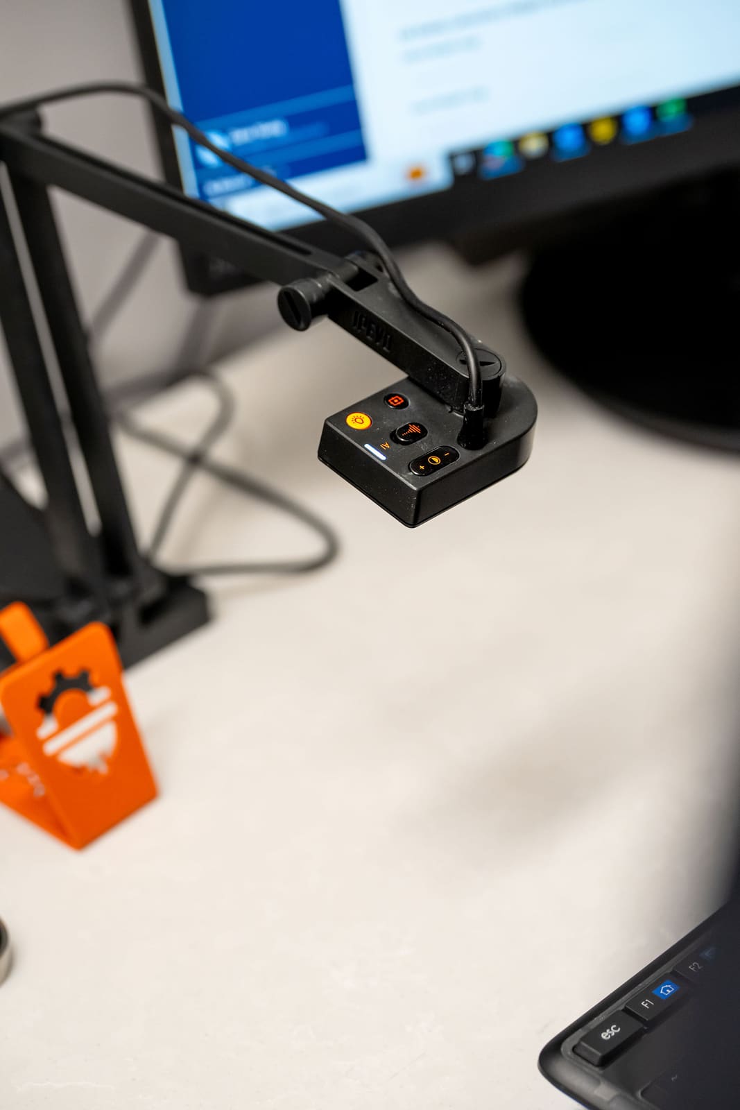 Sampling cassette being weighed on an analytical balance for gravimetric analysis