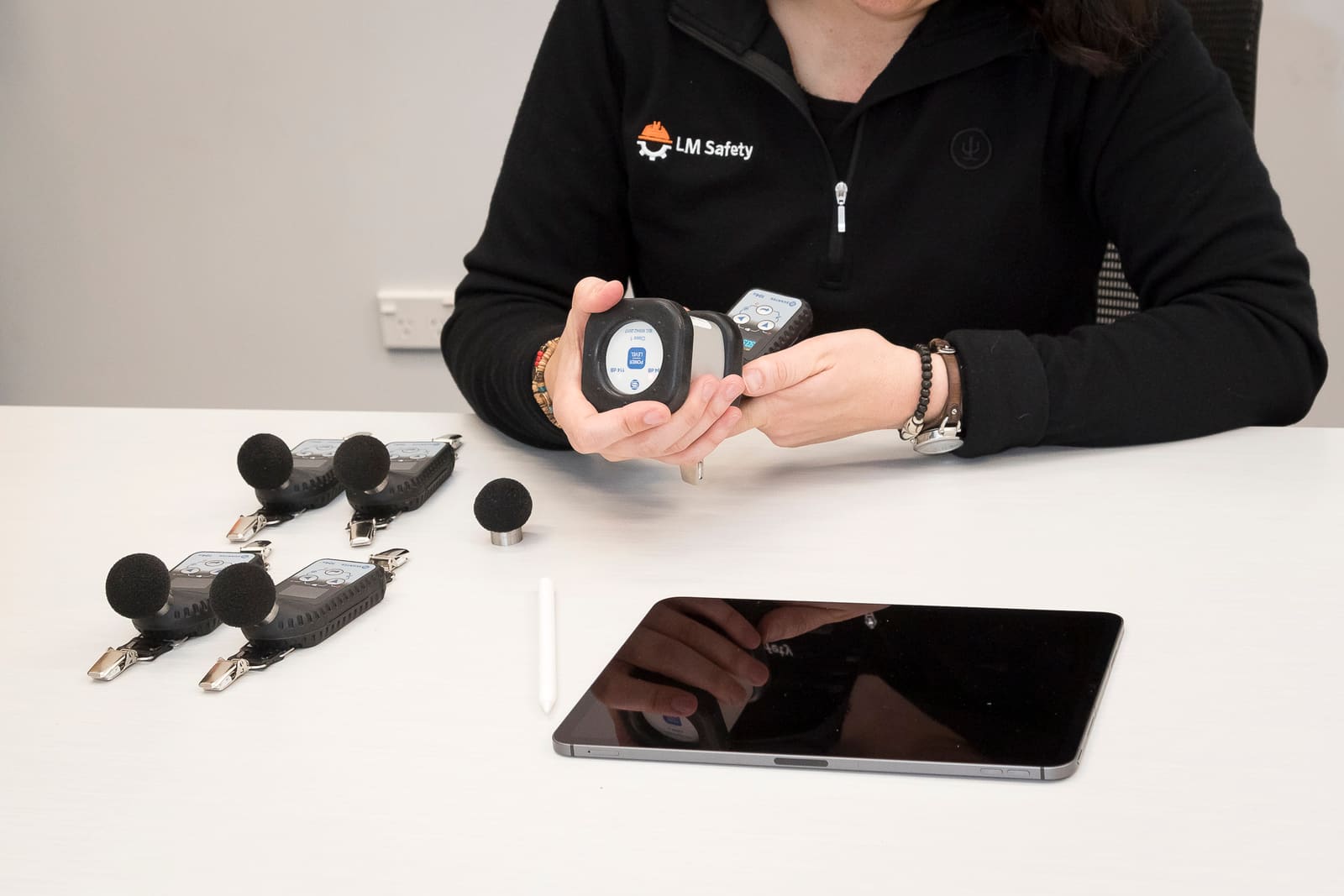 Survey data captured digitally on a tablet beside a sampling pump