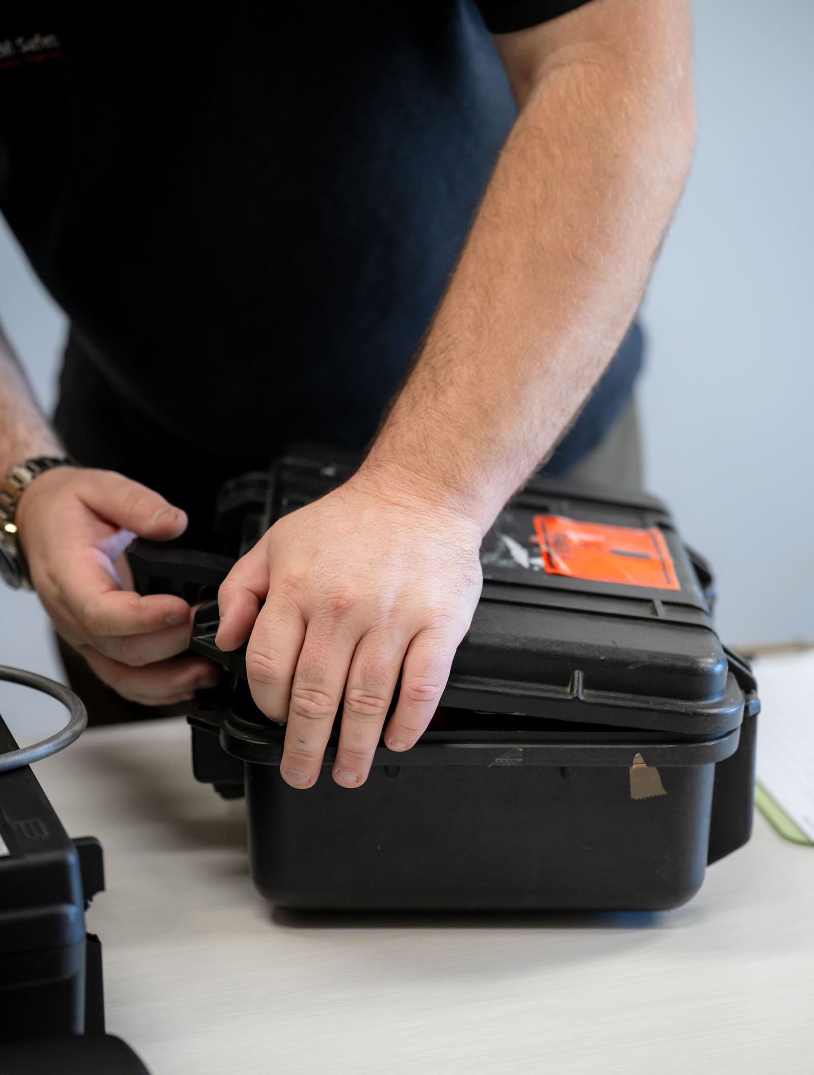 Sealing a case of calibrated sampling equipment
